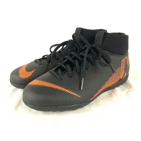 black and orange turf shoes